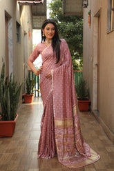 Luxuriant Bandhej Peach Color Silk Saree