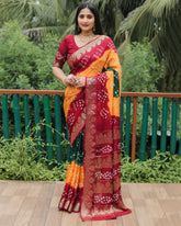 Outstanding Bandhej Orange Color Silk Saree