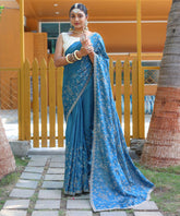 Ravishing Floral Design Teal Blue Color Saree