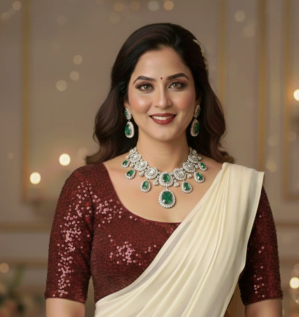 Cream Georgette Saree with Maroon Sparkle Velvet Blouse