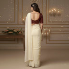 Cream Georgette Saree with Maroon Sparkle Velvet Blouse