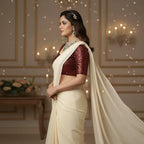Cream Georgette Saree with Maroon Sparkle Velvet Blouse