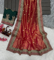 Eyes Catching Embroidery work Orange Color Saree