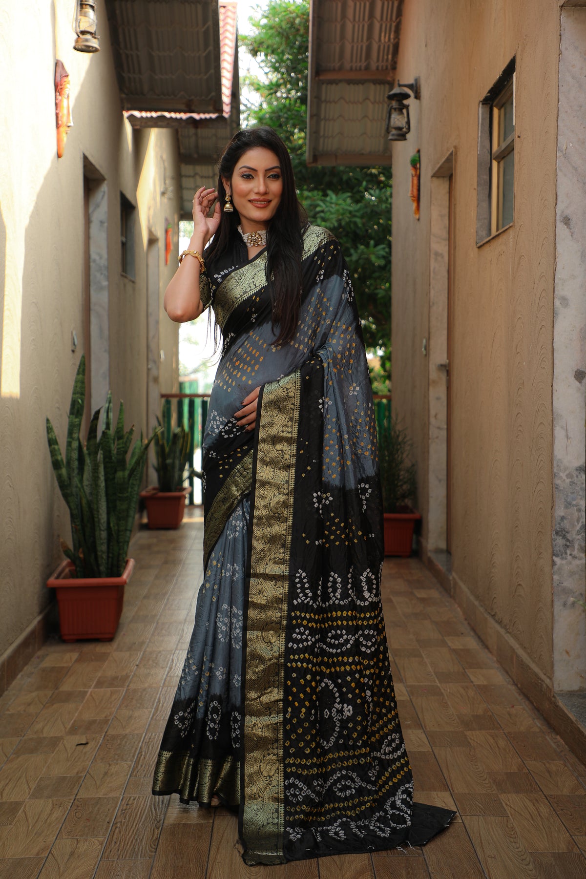 Glimmering Bandhej Grey Color Silk Sarees