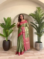 Fabulous Tissue Silk Green Color Saree