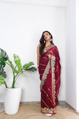 Glimmering Georgette Maroon Color Saree