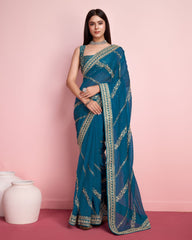 Innovative Teal Blue Color Taby Silk Saree