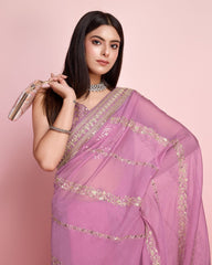 Innovative Dusty Pink Color Taby Silk Saree