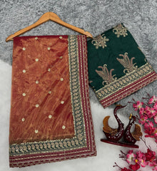 Eyes Catching Embroidery work Orange Color Saree