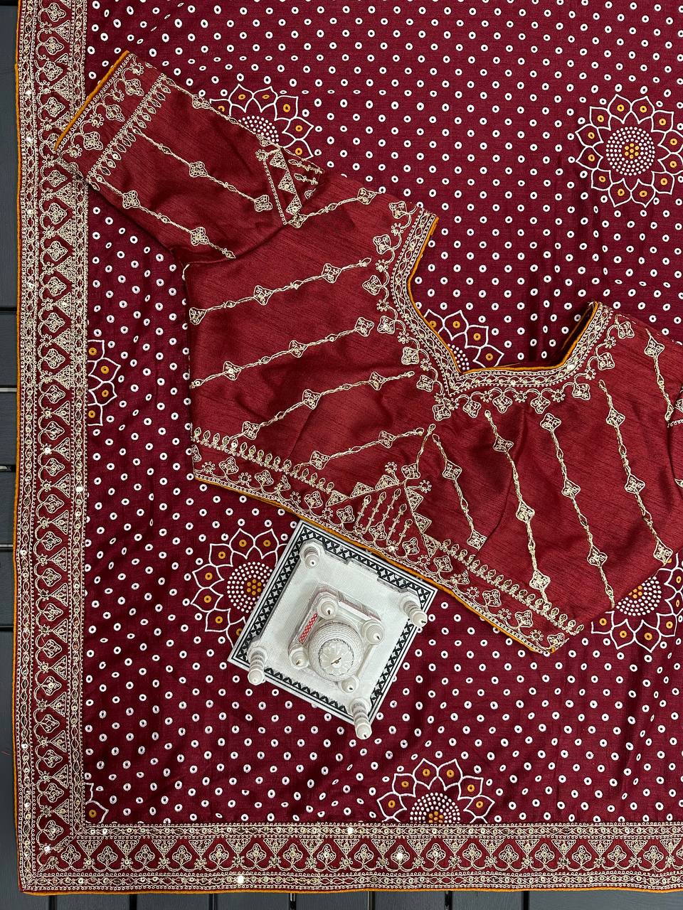 Exotic Bandhani Maroon Color Silk Saree